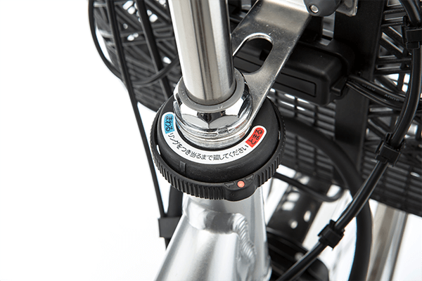 駐輪時にハンドル部を固定し、駐輪時の点灯を防止